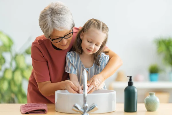 Cute Little Girl Her Grandmother Washing Hands Protection Infections Viruses — Stock Photo, Image