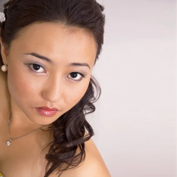 亚洲的年轻女人的画像 图库图片
