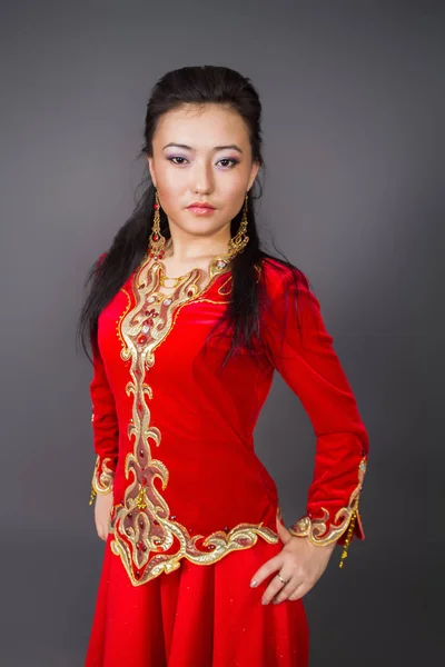 Beautiful Kazakh Woman National Red Costume Stock Photo