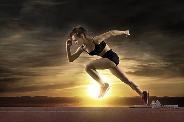 Woman Sprinter Leaving Starting Blocks Athletic Track — Stock Photo, Image