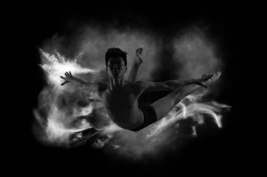 Genç yakışıklı bale erkek sinek grace poz. Dans Özgürlük kavramı