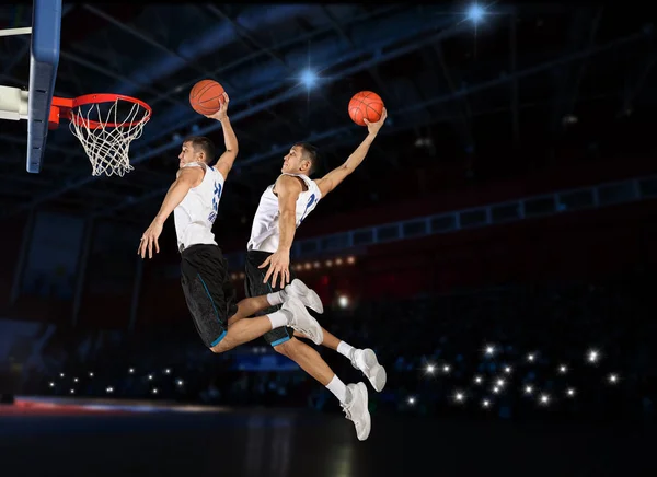 Basketball player in action in gym