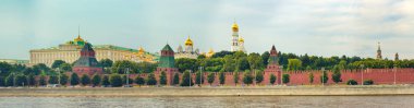 Panoramic view of Moscow skyline. Kremlevskaya naberezhnaya. Moskva river on the foreground. Panorama clipart