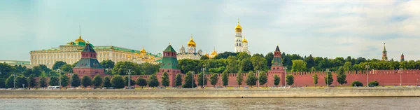 Panoramic view of Moscow skyline. Kremlevskaya naberezhnaya. Moskva river on the foreground. Panorama