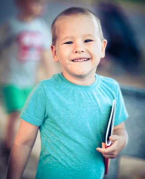 Outdoor portrait of cute little boy — Stock Photo, Image
