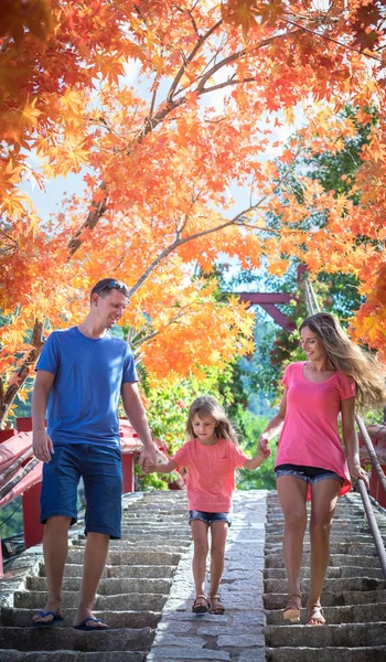 Outdoor portrait of a beautiful family — Stock Photo, Image