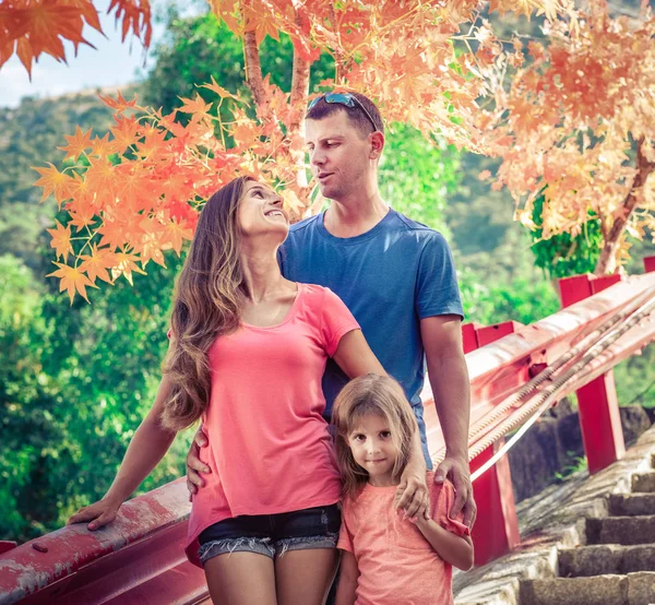 Outdoor portrait of a beautiful family — Stock Photo, Image
