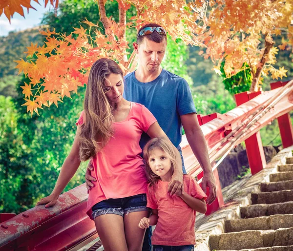 Outdoor portrait of a beautiful family — Stock Photo, Image