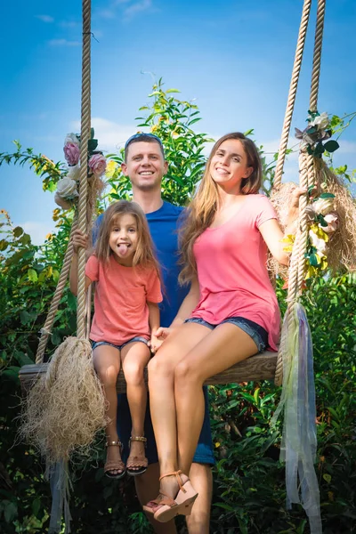 Outdoor portrait of a beautiful family — Stock Photo, Image