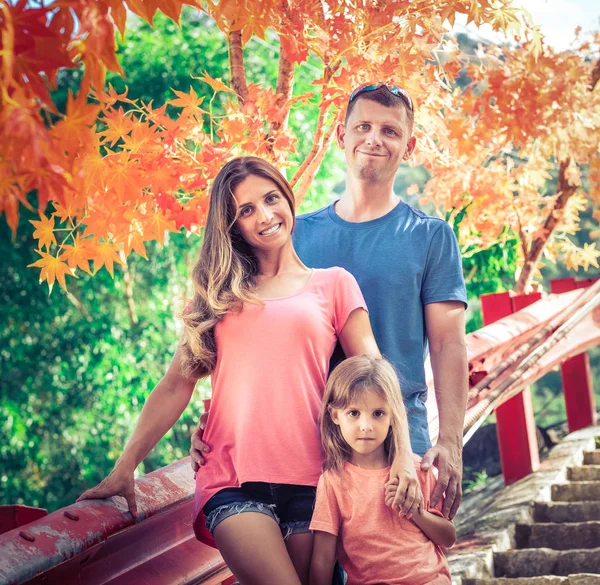 Outdoor portrait of a beautiful family — Stock Photo, Image