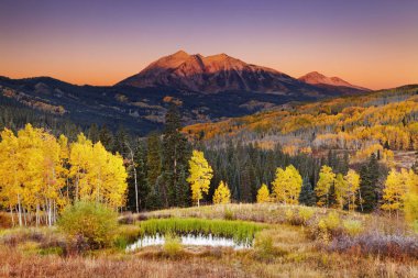 East Beckwith Mountain at sunrise near Kebler Pass in West Elk Mountains, Colorado, USA clipart