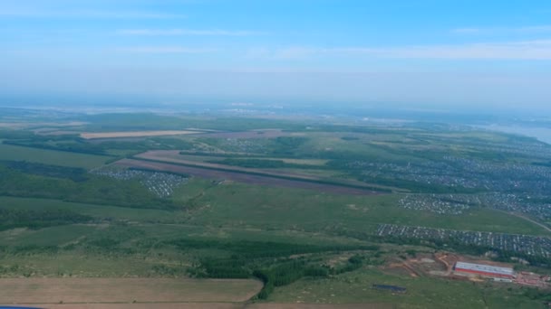 Aerial view from descending airplane — Stock Video