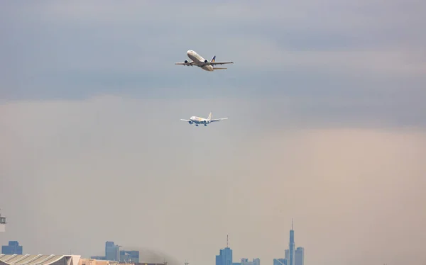 Two planes over the airport Royalty Free Stock Images