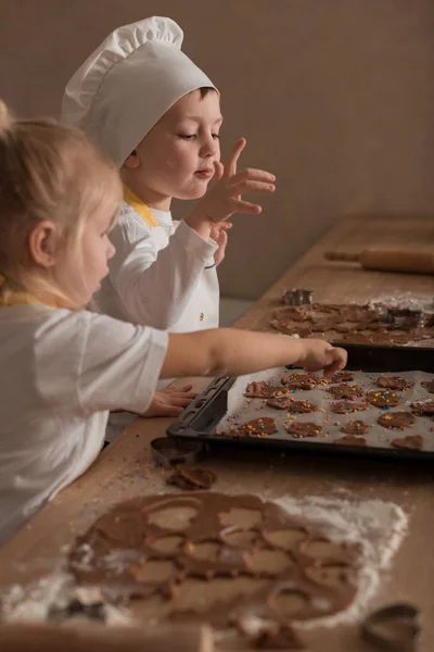 Baby Makes Christmas Cookies. Culinary Concept. Christmas Cooking. Children — Stock Photo, Image