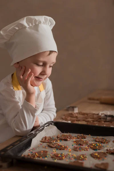 Baby Makes Christmas Cookies. Culinary Concept. Christmas Cooking. Children — Stock Photo, Image