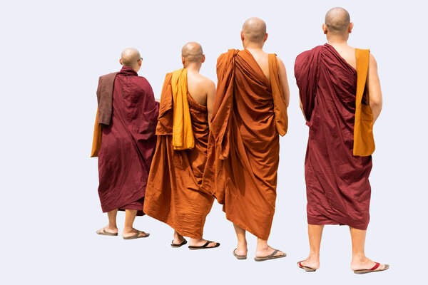 Photo of the Four Orange Monks. Religious Concept