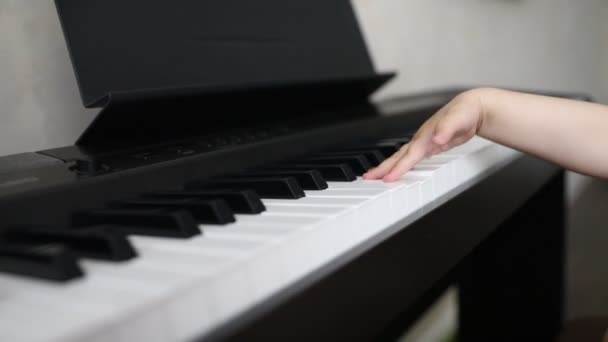 Little Babys First Acquaintance with the Piano Musical Instrument — Stock Video