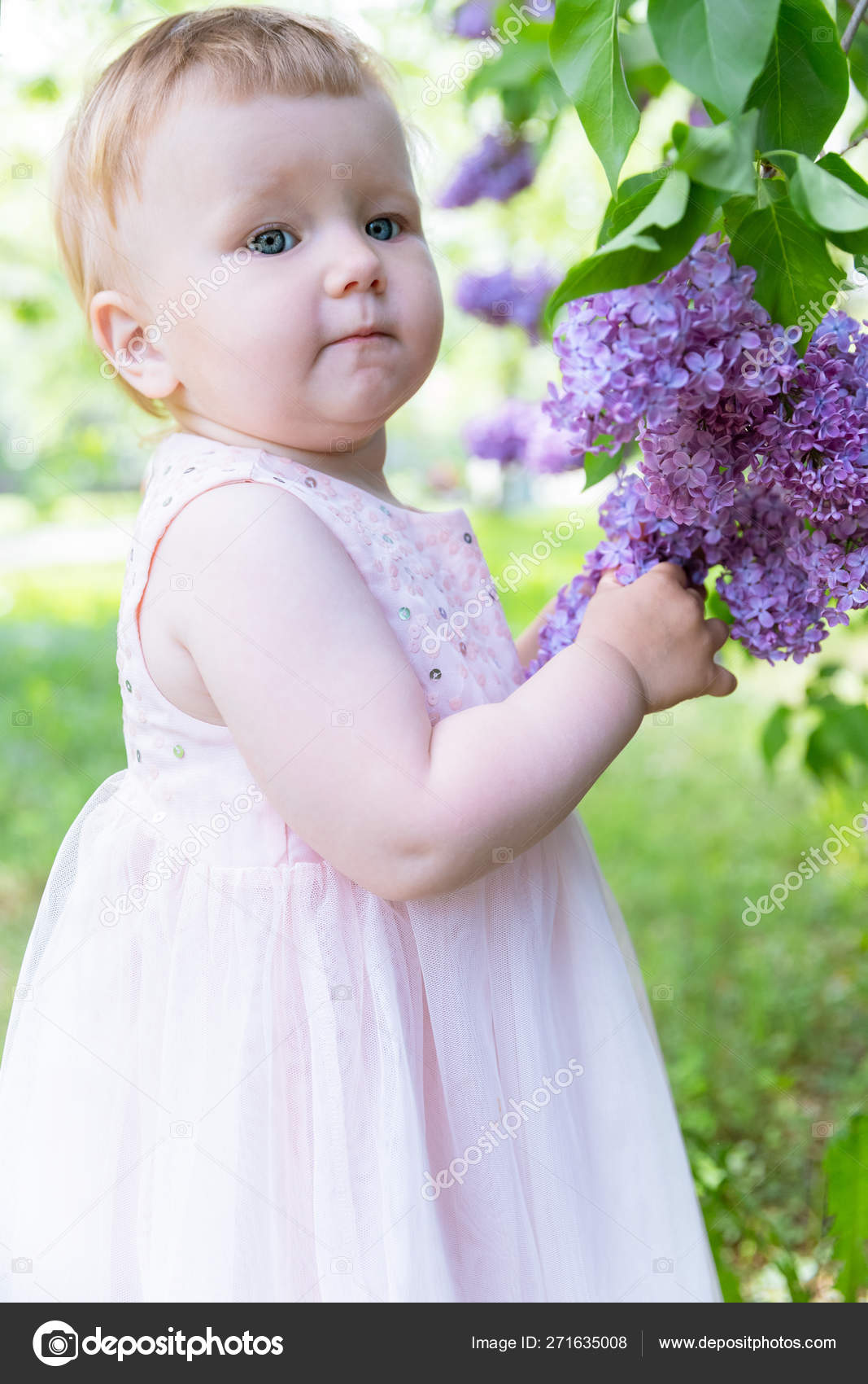 beautiful baby girl with flowers