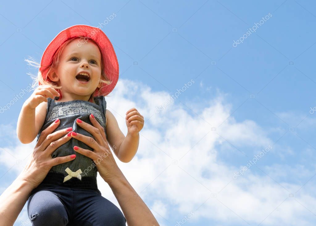 Happy Child in the Sky. Summer Concept. Childhood. Parenthood