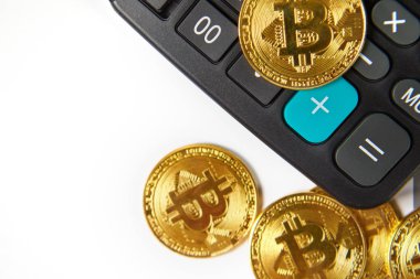 Hesap makinesi üzerinde cryptocurrency paralar (Bitcoin ve Ethereum).
