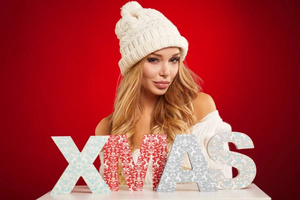 X-mas woman over red background