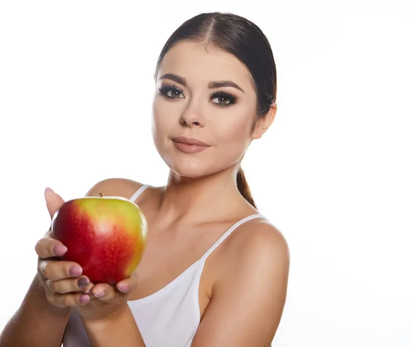 Beautiful close-up portrait of young woman with red apple. Healt — Stock Photo, Image