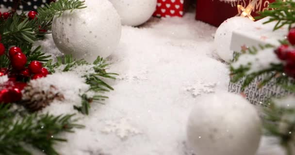 Red Christmas Holiday Gift Box Falling Snow Colorful Decorated Pine — Stock Video