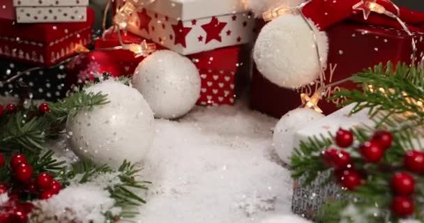 Red Christmas Holiday Gift Box Falling Snow Colorful Decorated Pine — Stock Video