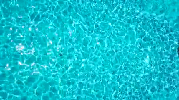 Topview from a drone over the surface of the pool — Stock Video