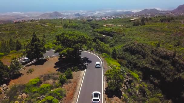 Top view of a car rides along a mountain road on Tenerife, Canary Islands, Spain. Way to the Teide volcano, Teide National Park — Stock Video