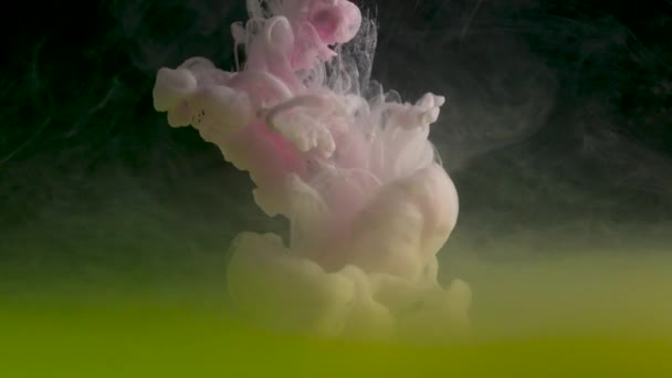 Color drop underwater creating a silk drapery. Ink swirling underwater — Stock Video