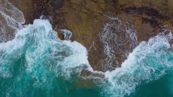 Top view of the desert stony coast on the Atlantic Ocean. Coast of the island of Tenerife. Aerial drone footage of sea waves reaching shore — Stock Video