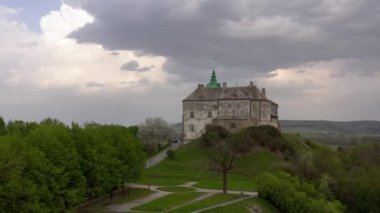 Aerial view of Olesky Castle in spring, Ukraine