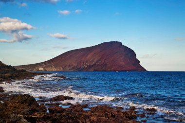 Playa de la Tejita'da gün batımı zamanı. Tenerife, İspanya