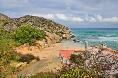 View of beautiful beach and sea bay  in Cala San Vicente, Mallor clipart