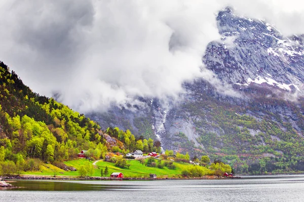fjord and clouds over mountains, Eidfjord, Norway