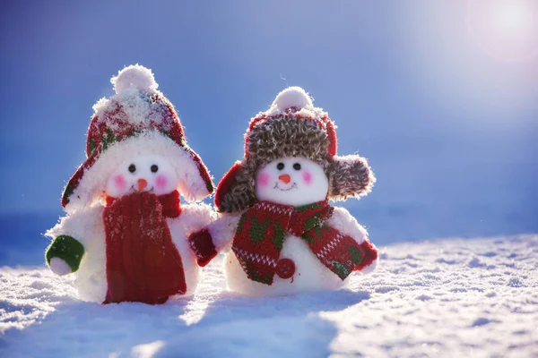 Snowmans on snow — Stock Photo, Image