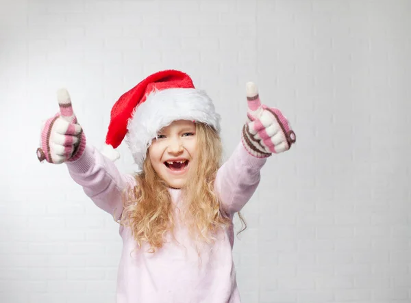Child in christmas hat — Stock Photo, Image