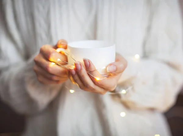 Coffee mug in female hands — Stock Photo, Image