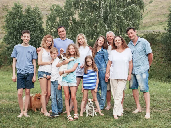 Large family outdoors — Stock Photo, Image
