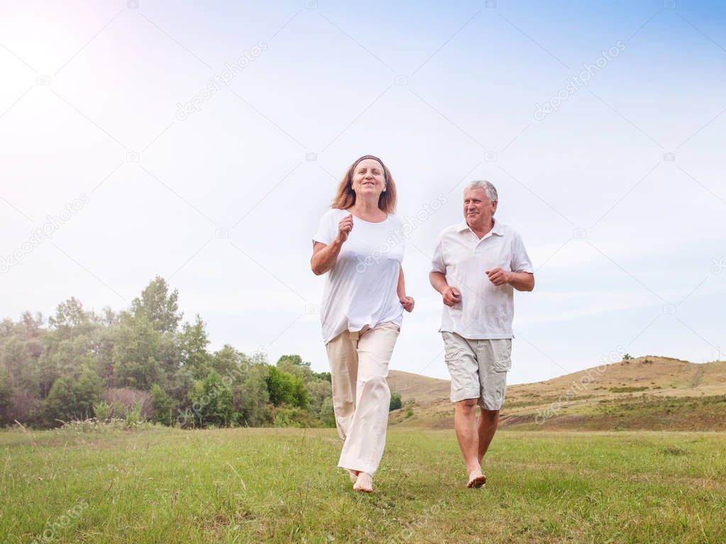 Happy couple running