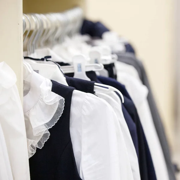 Hanger with shirts in a store — Stock Photo, Image