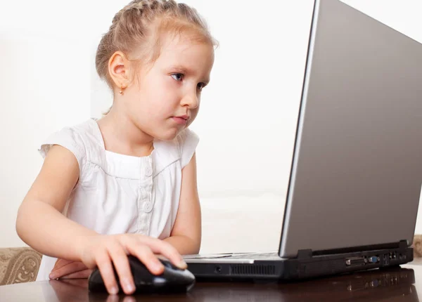 Child with laptop Stock Photo