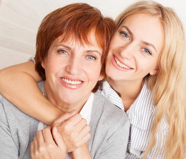 Mother with daughter at home — Stock Photo, Image