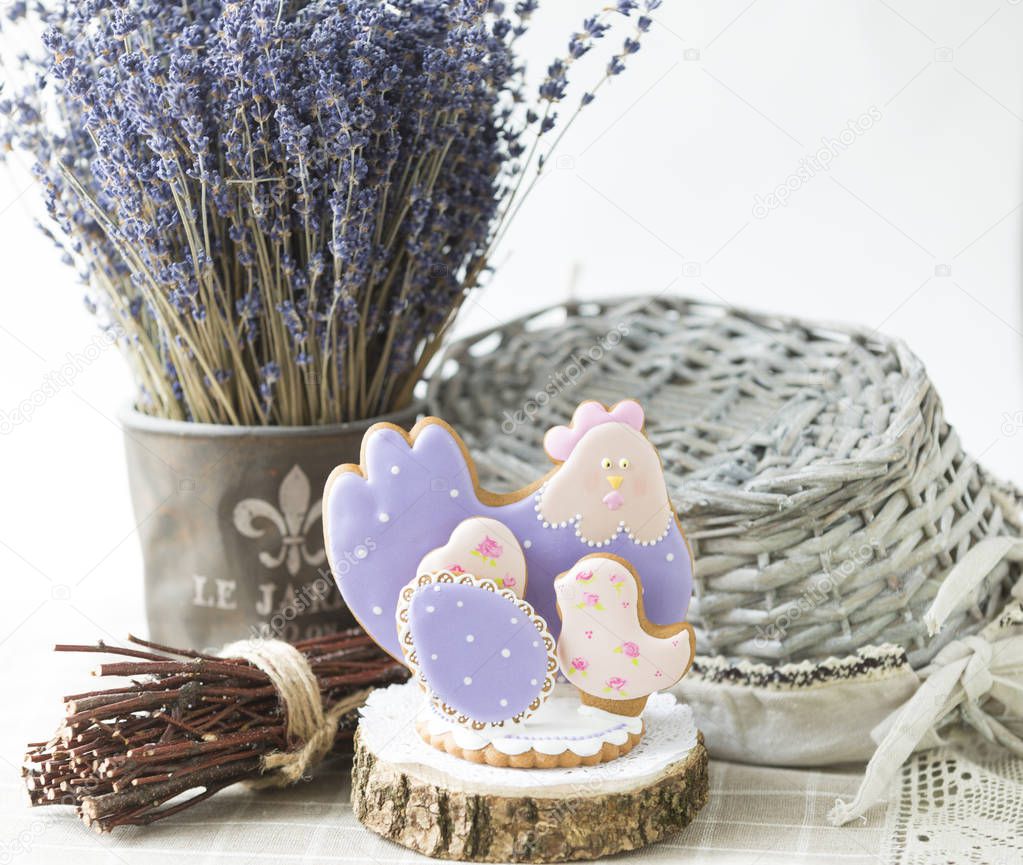 Easter gingerbread cookie bunnies with bucket of speckled Easter eggs