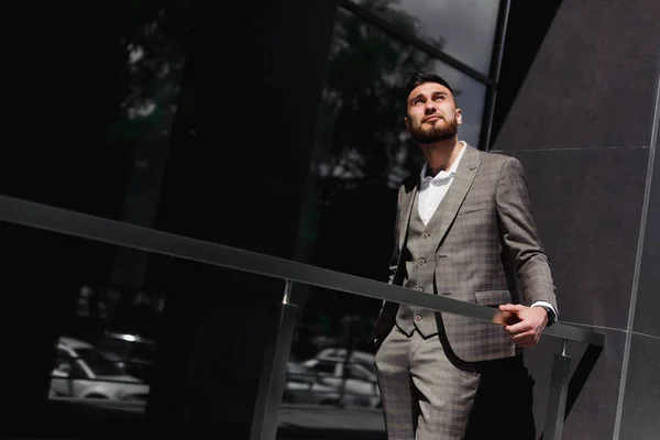 Businessman in city. Modern businessman. Confident young man in full suit standing outdoors — Stock Photo, Image