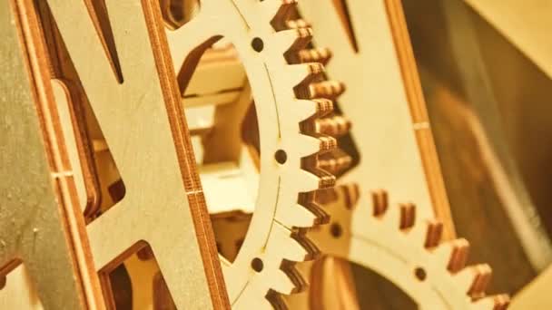 Wooden mechanism that consists of several gears transmitting motion — Stock Video
