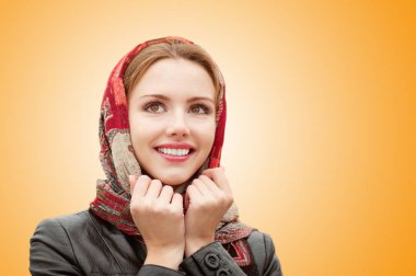 Portrait of beautiful charming smiling woman isolated on orange background. clipart