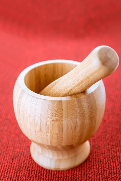 Wooden Mortar Pestle Red Woolen Carpet — Stock Photo, Image