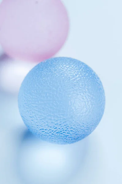 Blue Pink Silicone Balls Blue Table — Stock Photo, Image